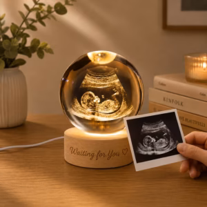 Personalized baby scan crystal ball lamp with 3D ultrasound engraving, warm LED wooden base, and custom keepsake design for expecting parents.