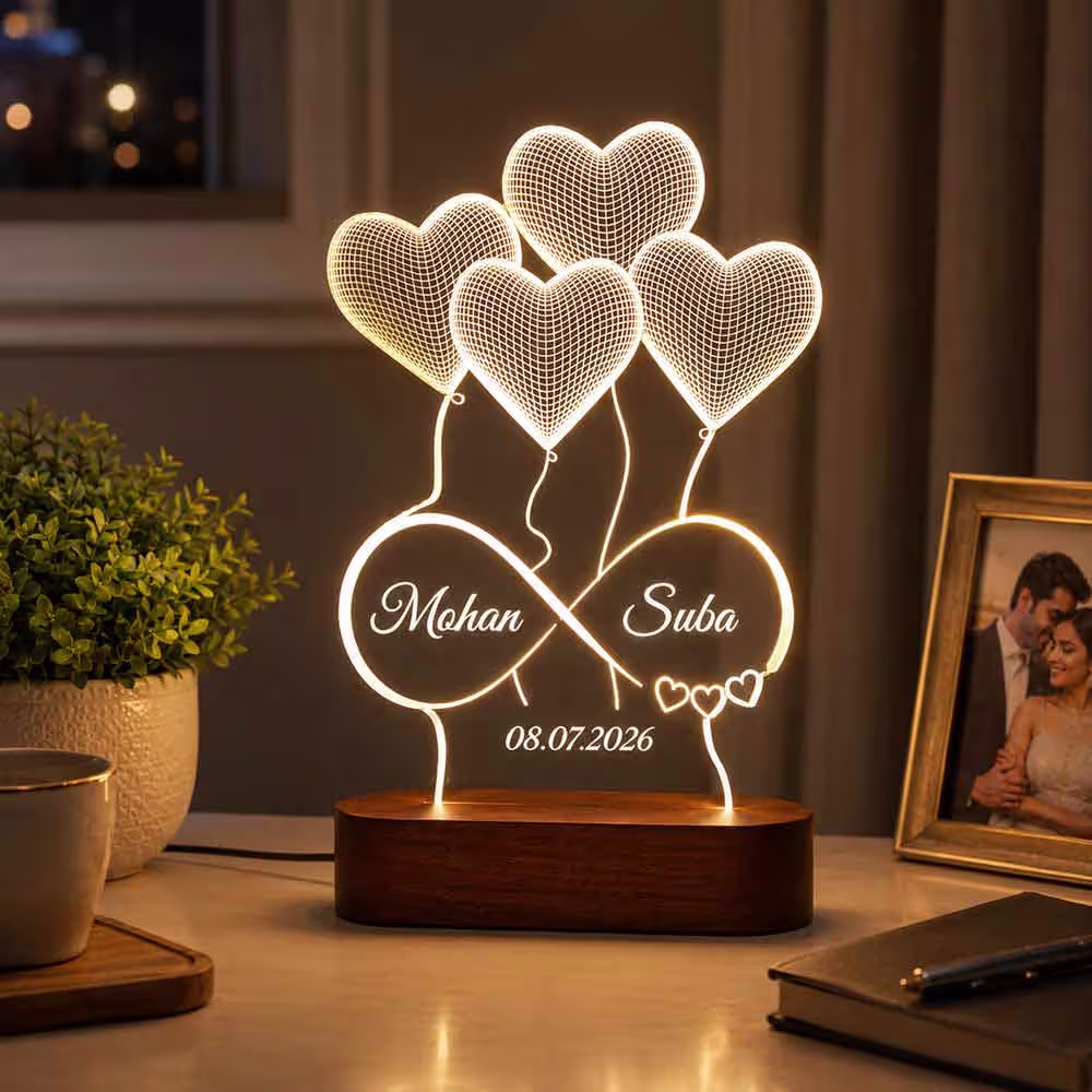 Personalized Infinity LED Lamp with Heart Balloons & Wooden Base A personalized acrylic infinity LED lamp with heart balloon design, engraved custom names and date, mounted on a premium wooden base with warm white LED illumination. An ideal personalized gift for weddings, anniversaries, engagements, Valentine's Day, and romantic occasions.